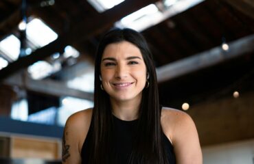 smiling woman in black tank top